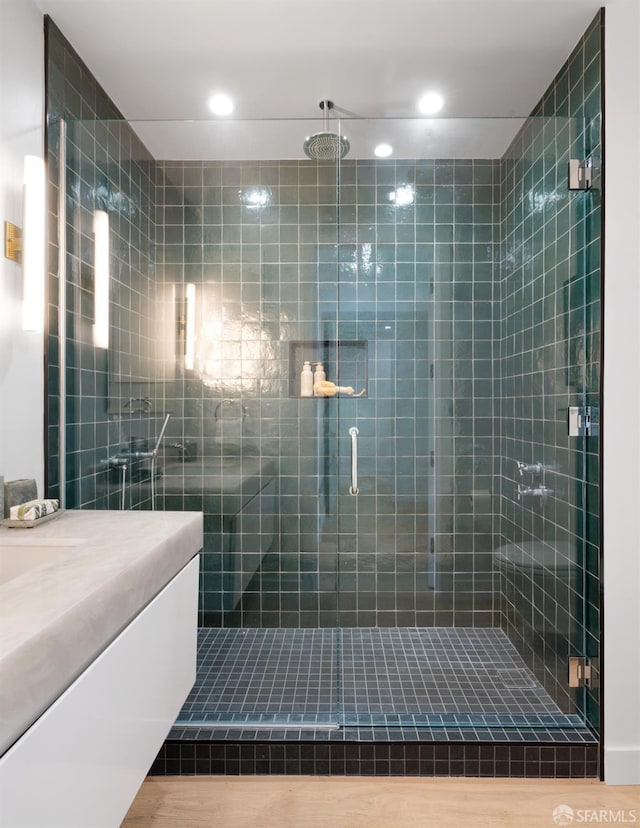 1070 Green St Unit 801, San Francisco, CA 94133 - full bathroom with a stall shower, vanity, and recessed lighting
