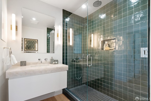 1070 Green St Unit 801, San Francisco, CA 94133 - full bathroom with a stall shower, vanity, and wood finished floors