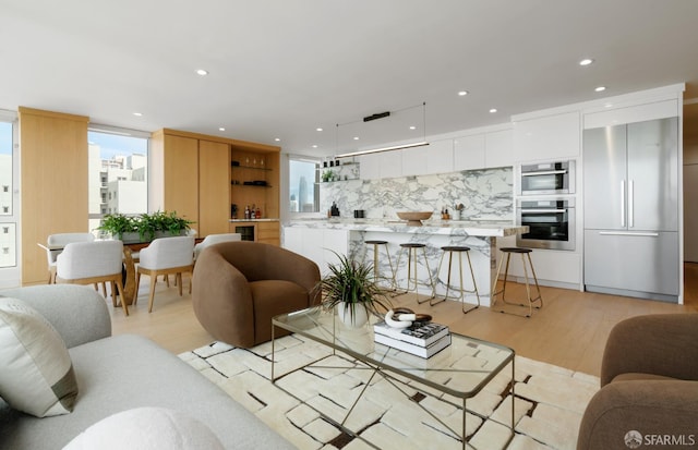 1070 Green St Unit 801, San Francisco, CA 94133 - living room with light wood finished floors, recessed lighting, and beverage cooler