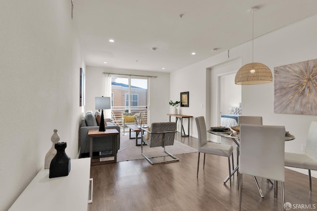 dining area with wood-type flooring