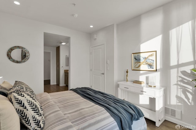 bedroom featuring wood-type flooring