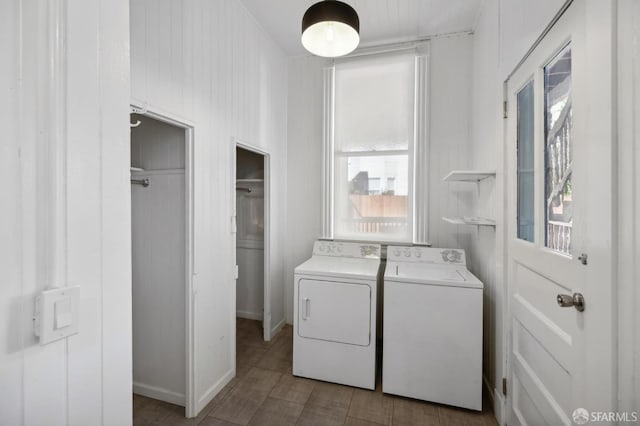 laundry area with washing machine and clothes dryer