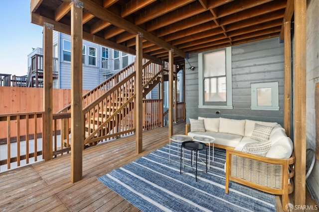 wooden deck with an outdoor hangout area