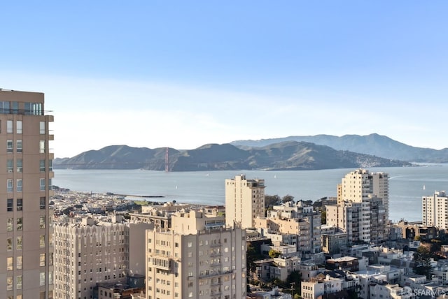 view of city with a water and mountain view