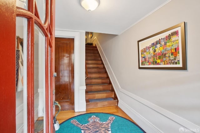 stairway with wood-type flooring