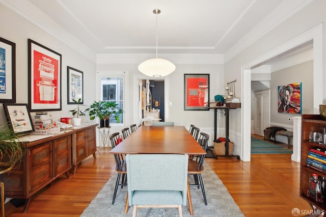 dining space with light wood-type flooring