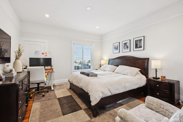 bedroom with light wood-type flooring