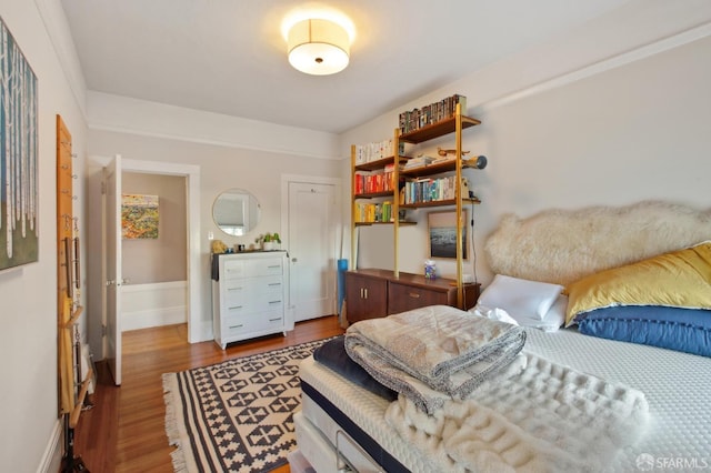 bedroom with light wood-type flooring