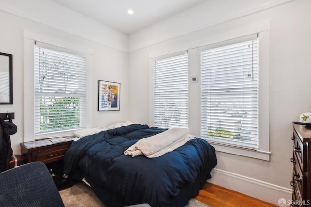 bedroom featuring hardwood / wood-style floors