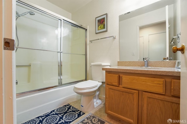 1310 Walden Rd Unit 15, Walnut Creek, CA 94597 - bathroom featuring shower / bath combination with glass door, toilet, tile patterned flooring, and vanity