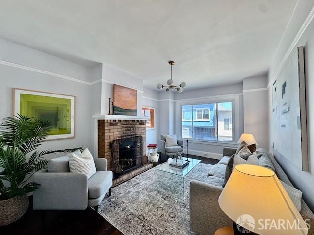 672 Prentiss St, San Francisco, CA 94110 - living room featuring wood finished floors, a brick fireplace, and a chandelier
