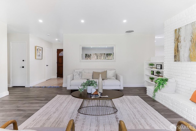 living room with dark wood-type flooring