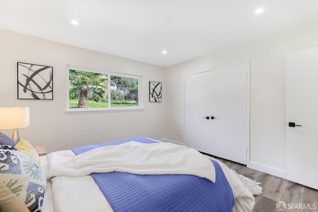 bedroom featuring light hardwood / wood-style floors