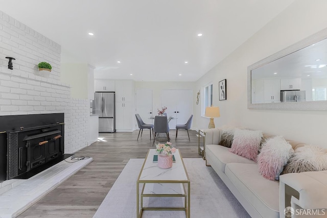 living room with light hardwood / wood-style floors