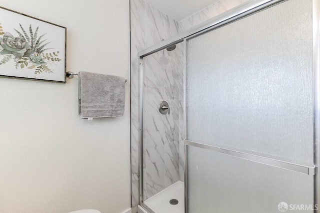 bathroom featuring walk in shower