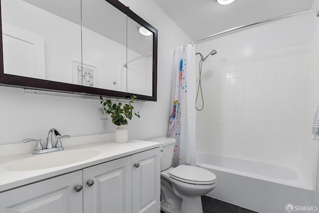 bathroom featuring shower / bath combo with shower curtain, toilet, vanity, and tile patterned flooring