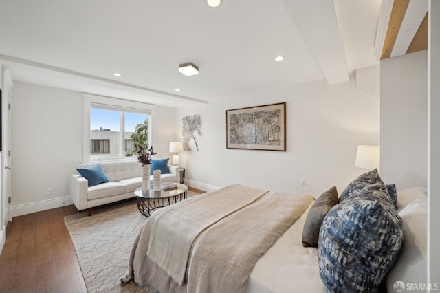 bedroom with hardwood / wood-style floors