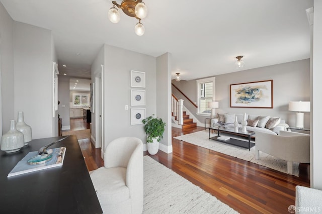 living room with dark hardwood / wood-style floors