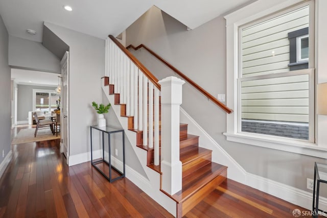 stairway with wood-type flooring