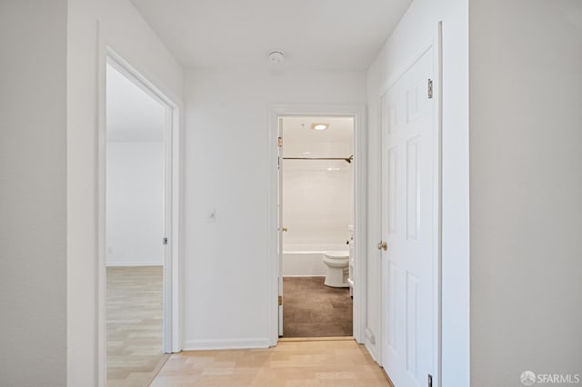 550 S Van Ness Ave Unit 306, San Francisco, CA 94110 - corridor featuring light wood-style flooring and baseboards
