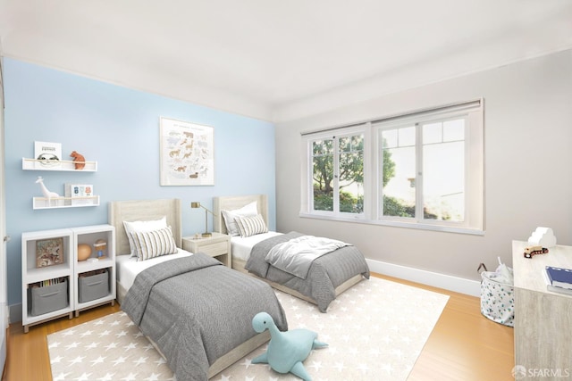 bedroom with wood-type flooring