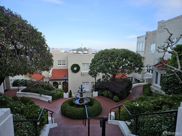 surrounding community with a patio area