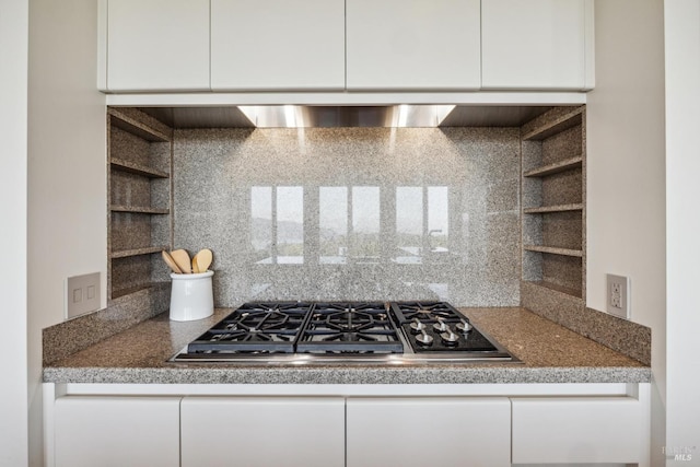 83 Mount Tiburon Rd, Tiburon, CA 94920 - kitchen with open shelves, stainless steel gas stovetop, white cabinets, backsplash, and exhaust hood