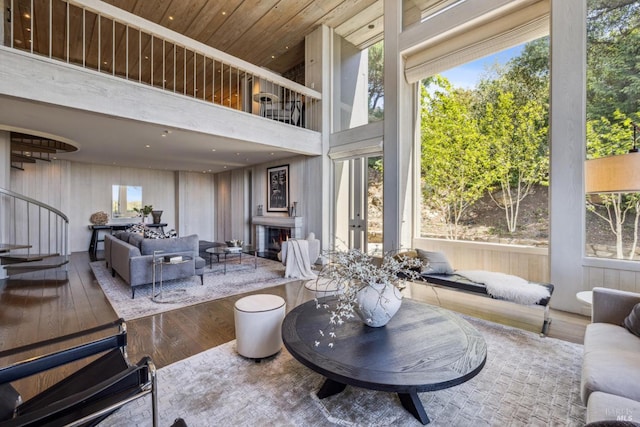 83 Mount Tiburon Rd, Tiburon, CA 94920 - living area featuring wood finished floors and a lit fireplace
