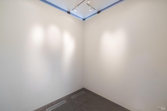 83 Mount Tiburon Rd, Tiburon, CA 94920 - empty room with baseboards and dark tile patterned floors