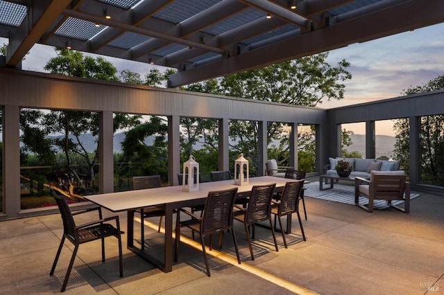 83 Mount Tiburon Rd, Tiburon, CA 94920 - patio terrace at dusk with outdoor dining area, outdoor lounge area, a pergola, and a patio area