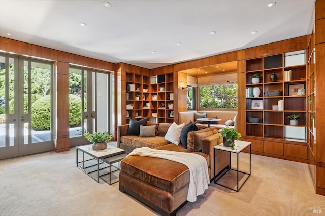 83 Mount Tiburon Rd, Tiburon, CA 94920 - living area featuring french doors, light carpet, plenty of natural light, wood walls, and recessed lighting