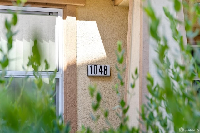 details featuring stucco siding