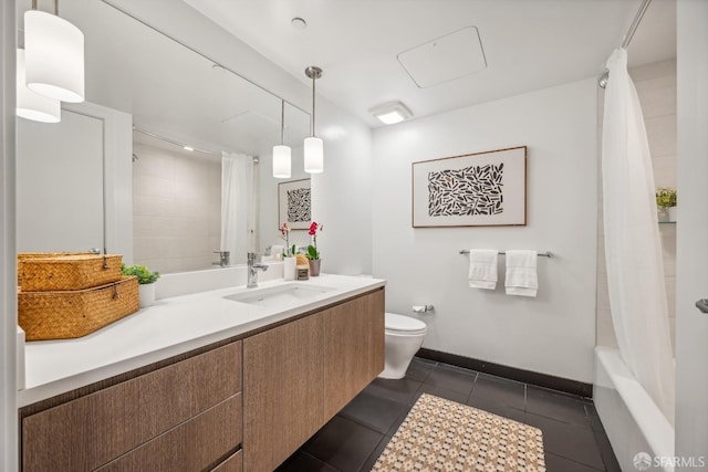 full bathroom featuring shower / bath combo with shower curtain, tile patterned flooring, vanity, and toilet