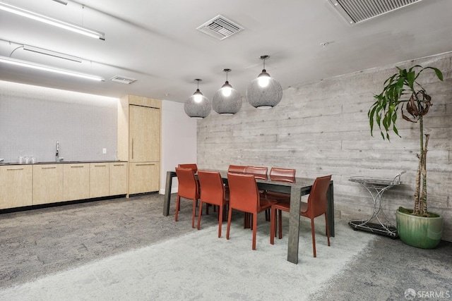 dining area featuring carpet flooring