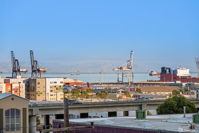 property's view of city featuring a water view