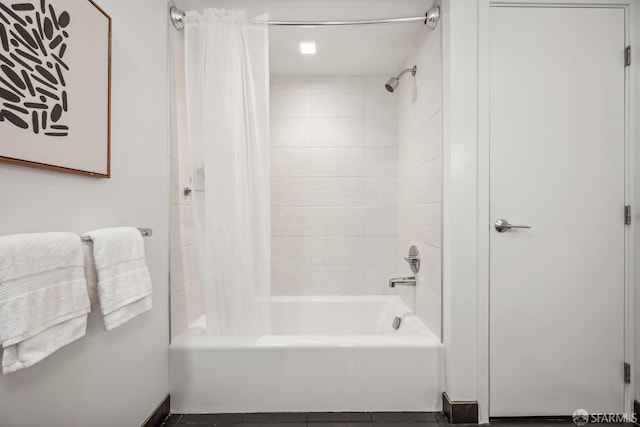 bathroom featuring tile patterned floors and shower / tub combo