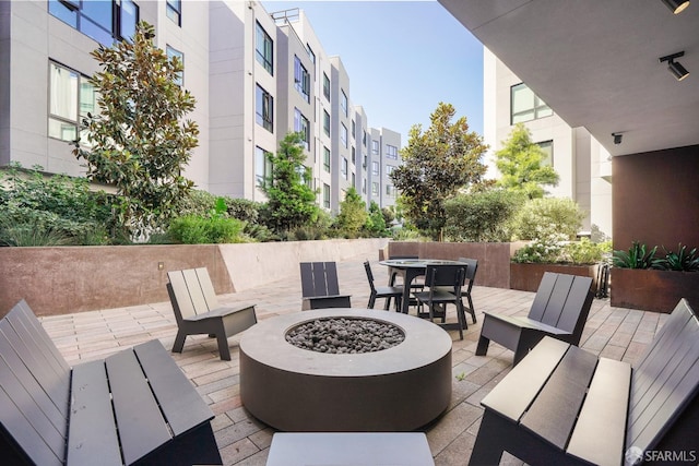 view of patio featuring a fire pit