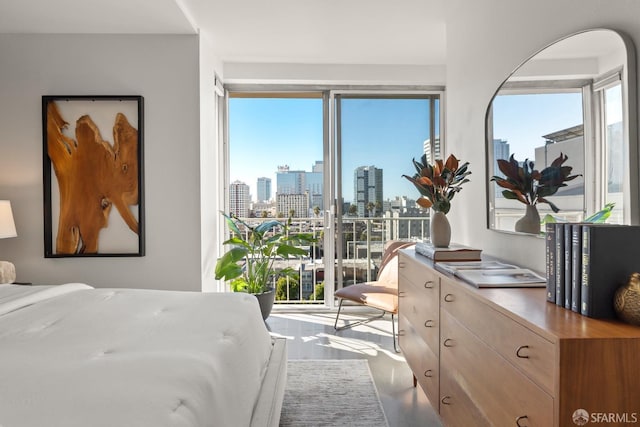bedroom with a view of skyline