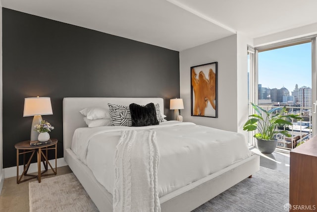 bedroom with a view of skyline