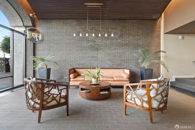 common area with brick wall