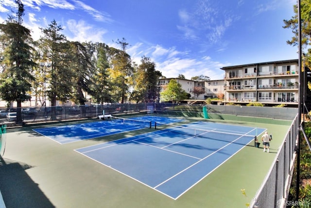 800 N Delaware St Unit 203, San Mateo, CA 94401 - view of tennis court with fence and community basketball court