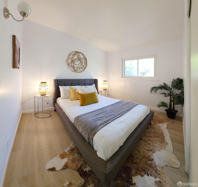 bedroom featuring hardwood / wood-style flooring