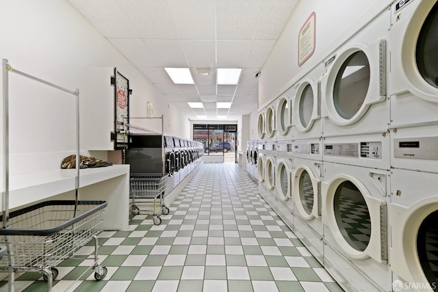shared laundry area with stacked washer and clothes dryer and washer and dryer