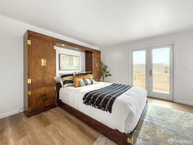 1113 Pebblewood Way, San Mateo, CA 94403 - bedroom featuring light wood finished floors, access to outside, and baseboards