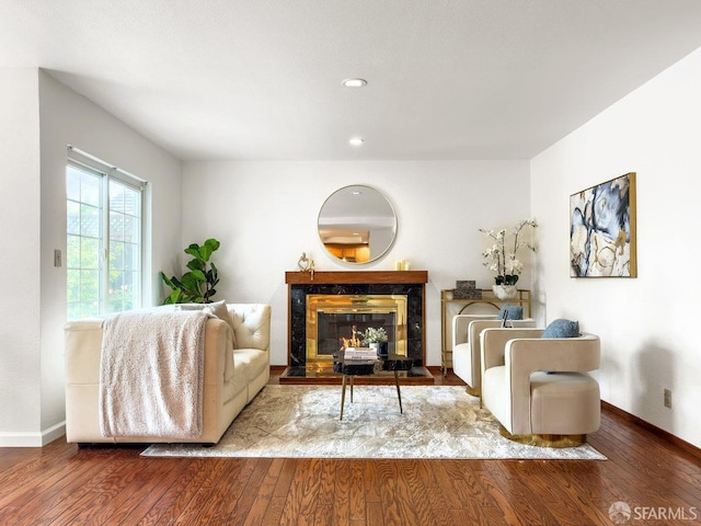 1113 Pebblewood Way, San Mateo, CA 94403 - living room featuring a fireplace, hardwood / wood-style floors, and baseboards