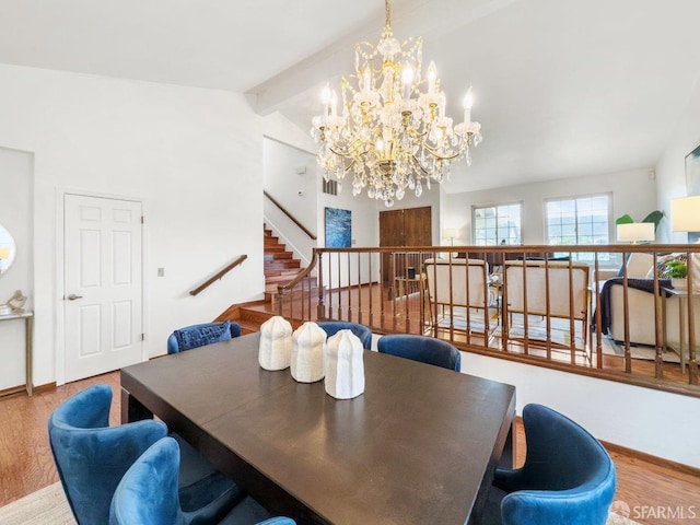 1113 Pebblewood Way, San Mateo, CA 94403 - dining space featuring lofted ceiling with beams, stairs, an inviting chandelier, and wood finished floors