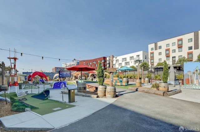 view of property's community featuring playground community