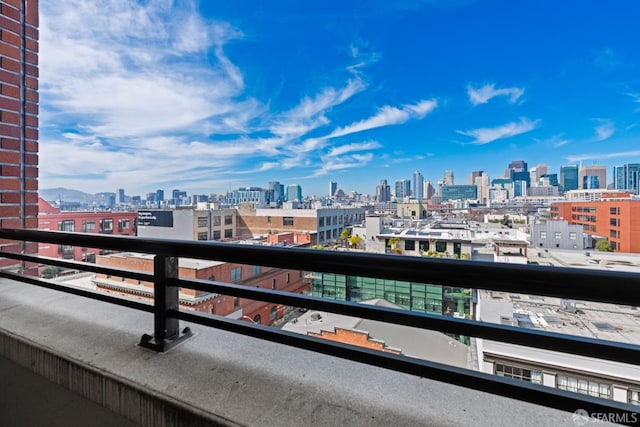 balcony featuring a city view