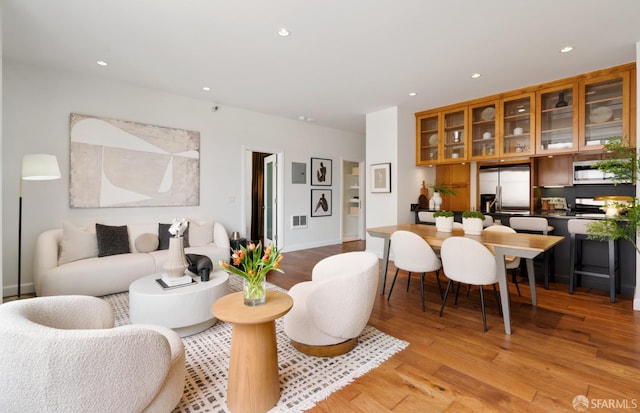 351 Buena Vista E Avenue 604E, San Francisco, CA 94117 - living area featuring light wood-style floors and recessed lighting