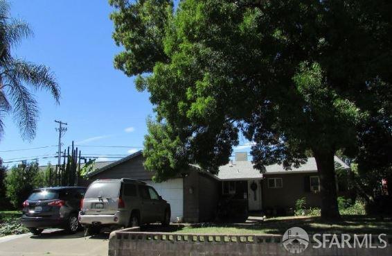 ranch-style home with a garage